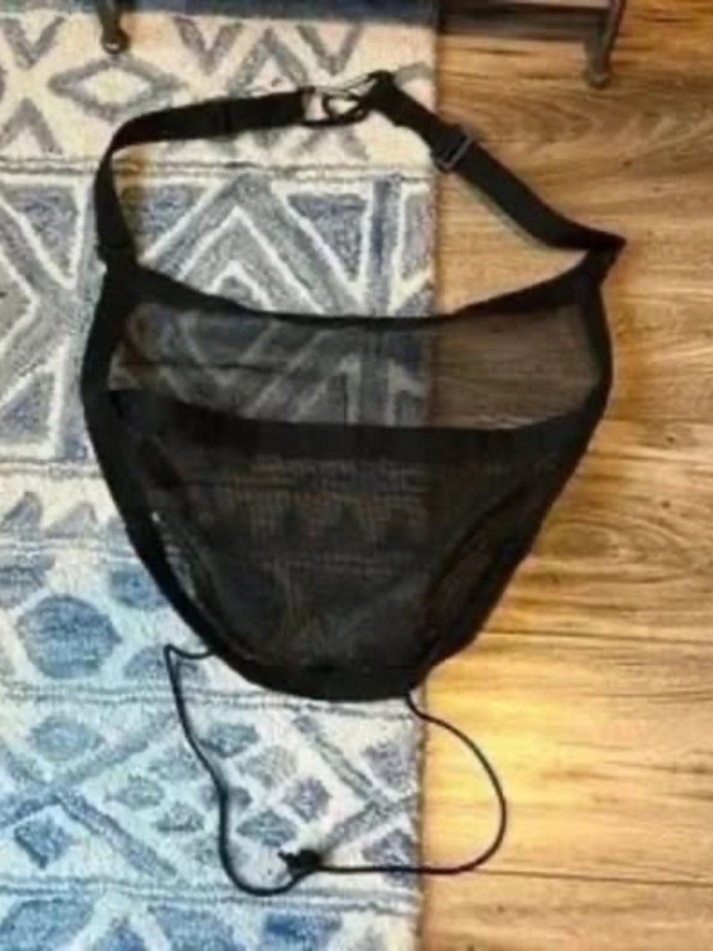 Hanging black mesh car seat organizer